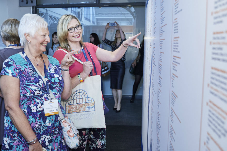 (l-r) Rita Nibbs and Rachael Barnes from Dragonfly Cards and Gifts find their names on the Wall of Fame.