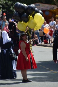 Beverley Green and the 22 balloons she released at the parade