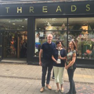 Delighted Threads owners and Retas winners, mum and daughter team Cheryl Clements and Lara Wares with Lara's husband Rodger