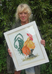 Above: Angela Hewiit with the cockerel painting that sparked the action.