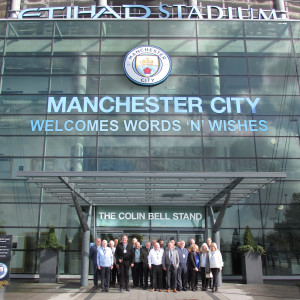 The Words ‘n’ Wishes team outside the Etihad stadium, home of Manchester City.