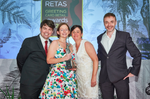 The Tutbury Present Company’s co-owners Nicky Stephenson and Clare Jarvis collecting their Retas award in July from (right) Second Nature’s Chris Bryan.