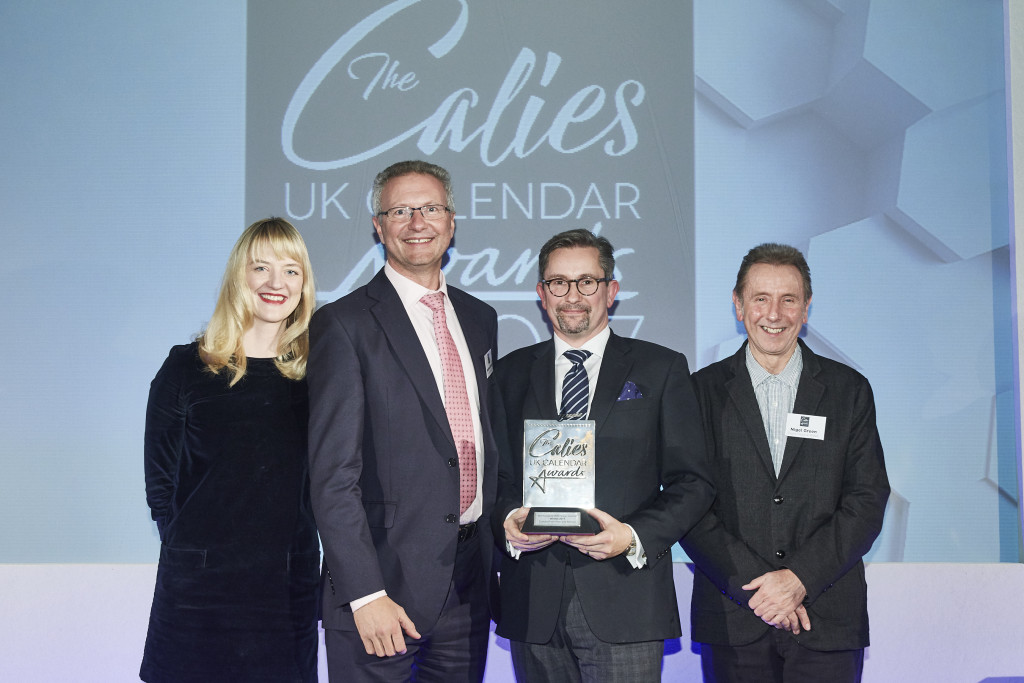 (Right-left) Nigel Green, owner of 8 Days a Week presented the trophy to Allan and Bertram’s group sales director, Paul Cecil and its managing director, Andrew Bennett.