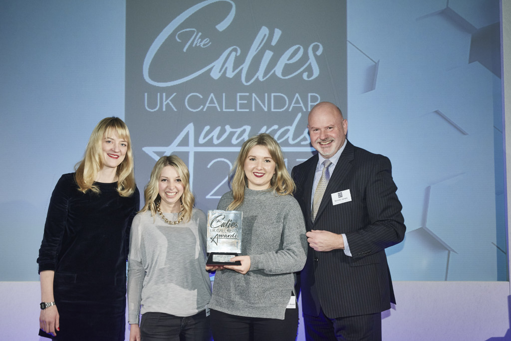 Premier Paper’s group marketing director Dave Jones presented the trophy to Portico Designs’ sales and marketing director Charlie Bassil (2nd right) and project manager Alice Entwistle.