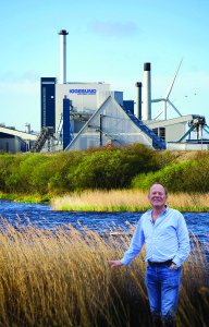 Bruce Podmore, md of Windles in front of the Iggessund papermill in Workington.
