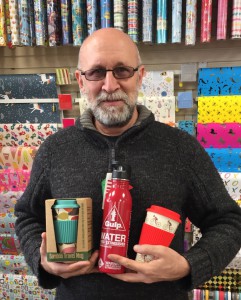 Romantica’s Nik Gornall with some of the reusable drinkware items he is promoting in his campaign.