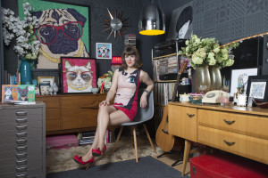 Rose Hill in her studio surrounded by her famous pop art pet portraits.