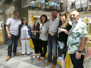 Moonpig’s Geoff Sanderson (far left) at the opening party of Moonpig’s new HQ with (right-left) Nick Adsett (GBCC), Victoria Connor, Julia Broughton, Liam Riley (GBCC), Sarah-Jane Porter (Moonpig), Julia Broughty (freelance designer) and Debbie Wigglesworth (The Paper Library).