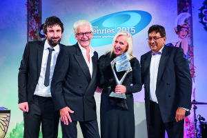 Jennie and John Procter (centre two), who founded Scribbler in 1981 were presented with the Honorary Achievement Award at The Henries in 2015.