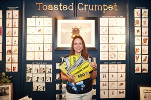 Toasted Crumpet’s Jo Clarke and her many gold and silver tickets spent on her stand last year.