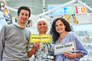 Postmark’s Mark and (right) Leona Janson-Smith added to the ticket action on Paper Salad’s stand which co-owner Karen Wilson was very pleased about.