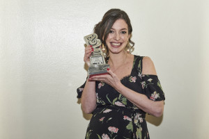 Sara Miller holding with the B&LLAs trophy for Best Licensed Talent or Fashion Brand 2018, that has been awarded to Sara Miller London.