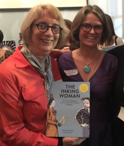 Cath Tate (left) and Nicola Streeten (right) with their recent book on female cartoonists.