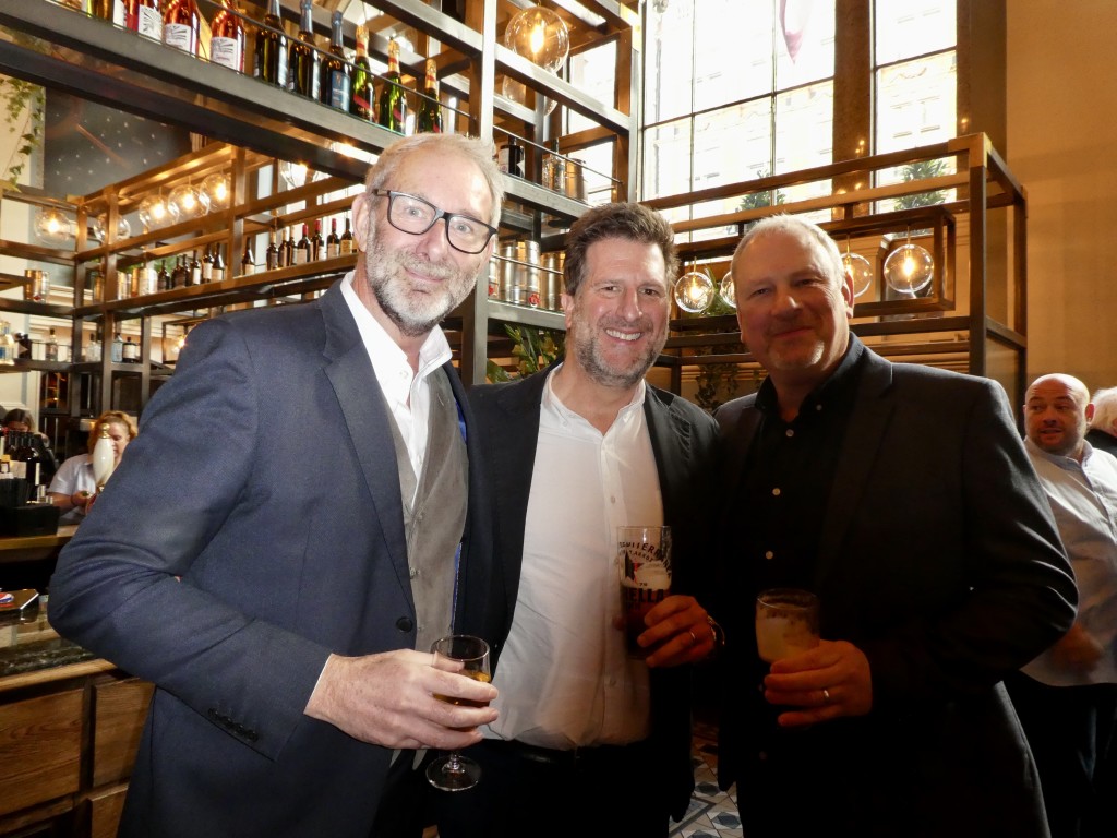 Above: David Byk (centre) with fellow council member Brett Smith (right) of Emotional Rescue, and Ged Mace, The Art File md and GCA past president and former long-time council member