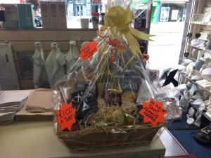 Above: The IC&G hamper was displayed on the counter  to promote the raffle that raised £150 for the St Francis Hospice. 