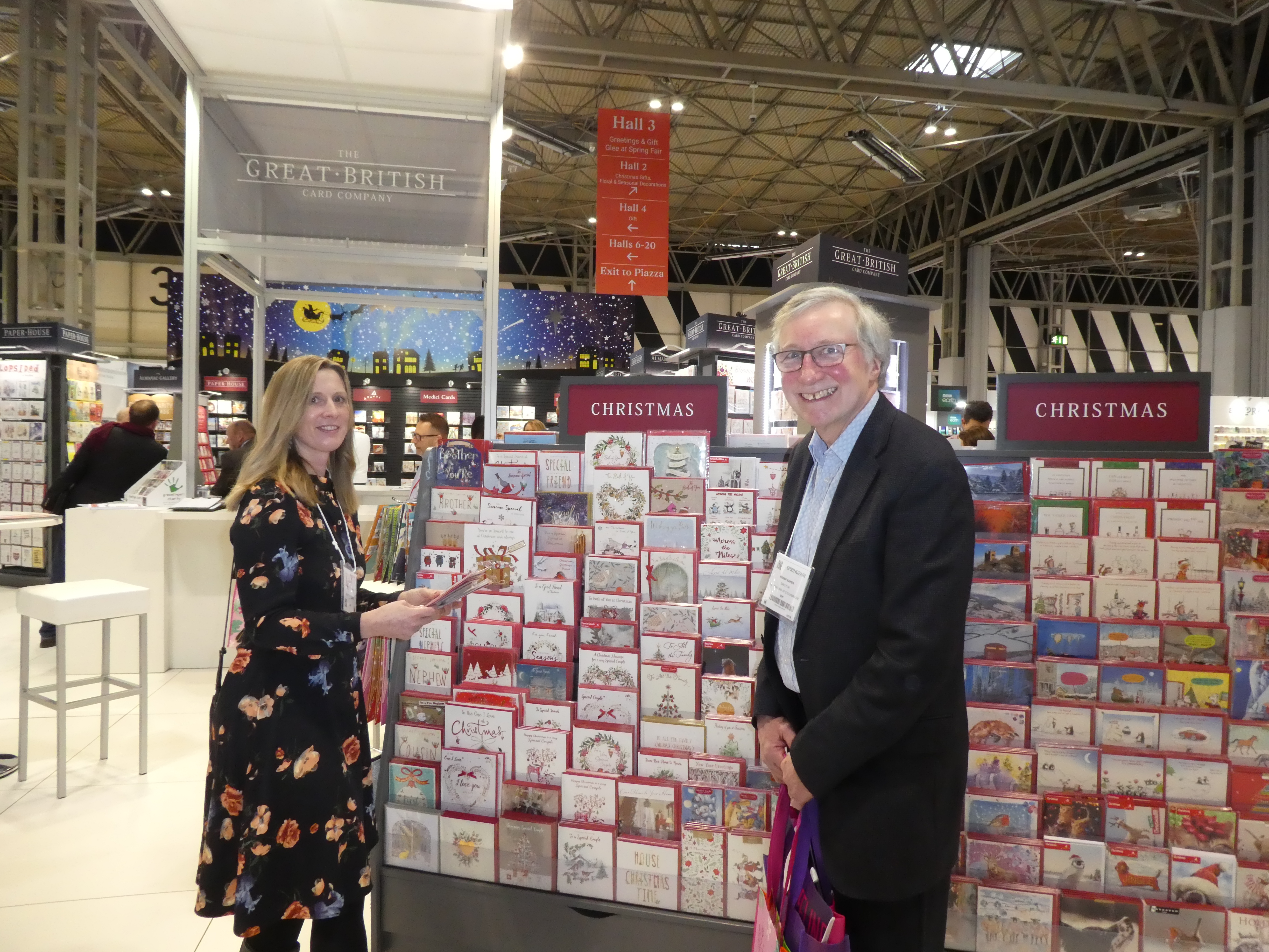 Above: Celebrations’ Roger Eames with his business partner Laura Didehvar on the GBCC stand at Spring Fair looking at the new Christmas collection.