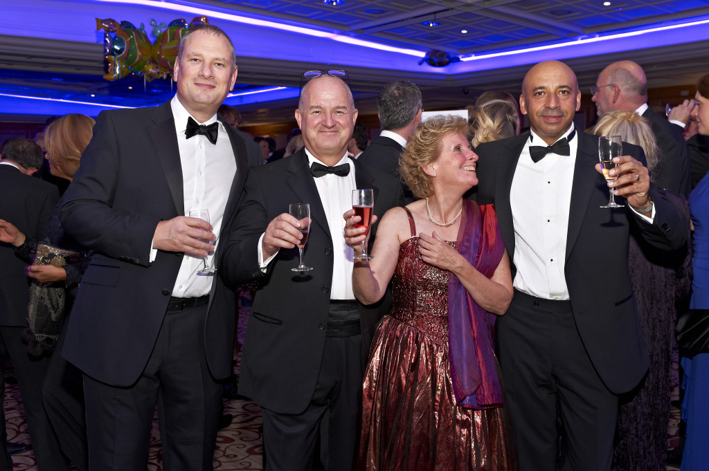 Above: A prophetic photo at a Henries event. Brett Smith (left) with David Greaves (right), Martin Nevin (second left) and Ruth Young (Clintons).