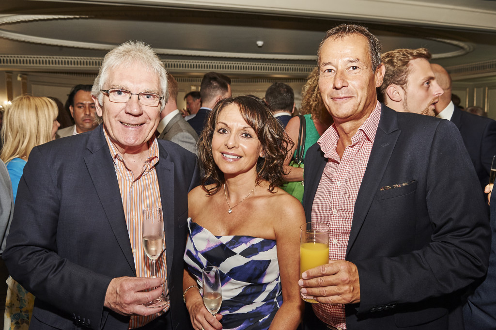 Above: CBG’s ceo Alister Marchant (right) with independent retailers George and Yasmin Twist of GeeTees.