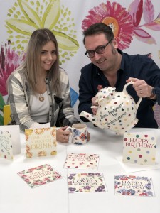 Above: Woodmansterne’s creative director Lee Keeper (right) with designer Hope Glass and the giant teapot Emma Bridgewater gave to the publisher to christen the licensing relationship.
