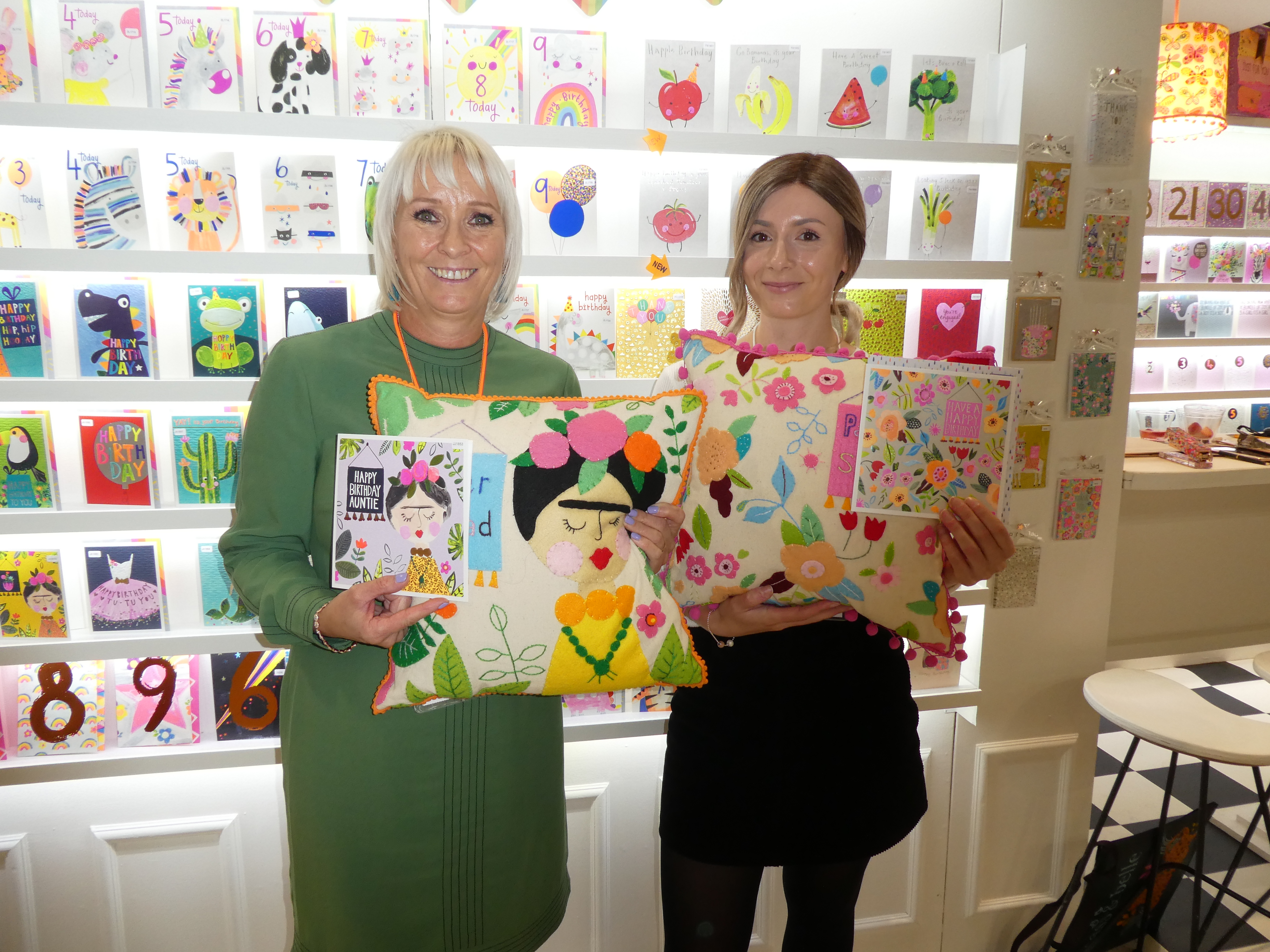 Above: All Paper Salad teamsters were asked to make something (other than cards) that represented the company. The winning entry were some fabulous cushions based on two of the publisher’s cards, which are modeled here by co-founder Karen Wilson (left) and designer Leanne Smith.