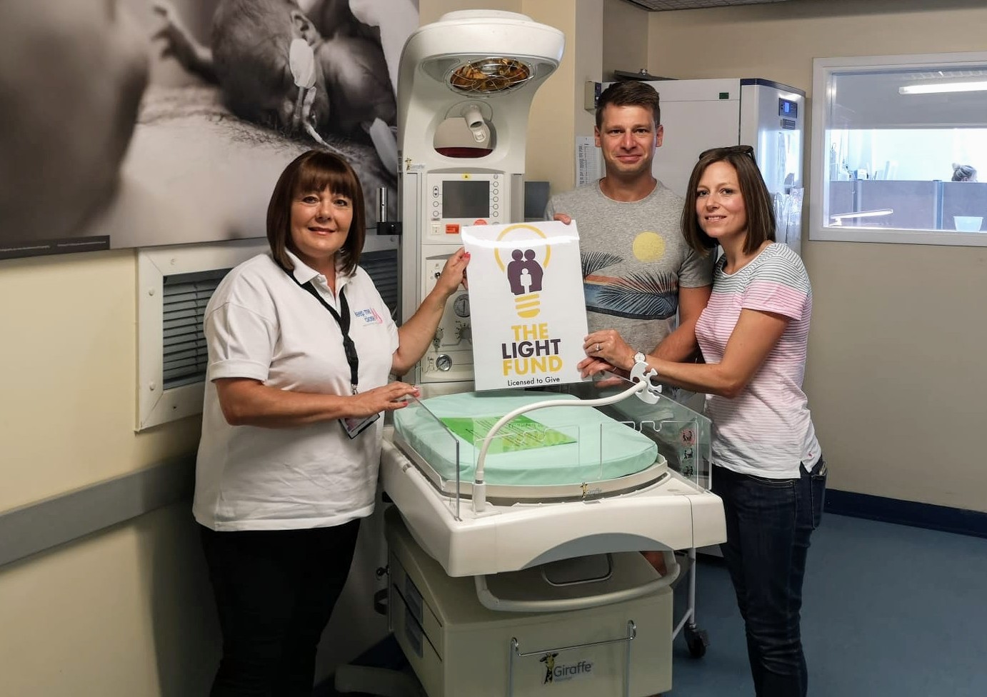 Above: Two parents who had premature babies presebted the hot bed to the Special Care Baby Unit at Plymouth hospital on behalf of New Life, with The Light Fund covering the costs. 
