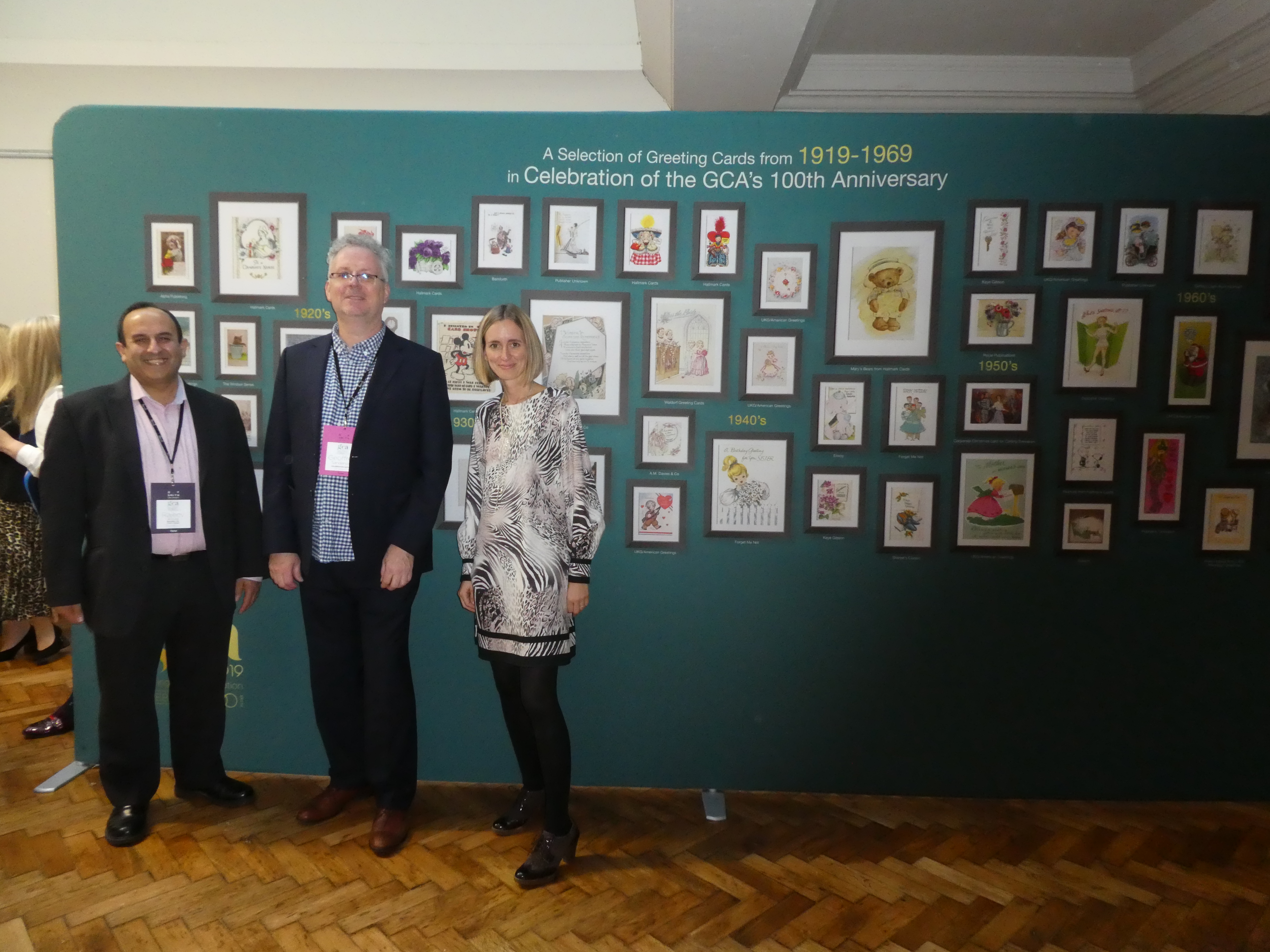 Above: The exhibition team (right-left) Helen Snell of Orchard House Design whose company donated the design time, Celebration Nation’s Geoff Sanderson who curated it and Raj Arora of Davora whose sibling company produced the canvas display panels and transportable frame. 