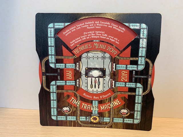 Above: The Henries’ ‘time machine’ menu was designed by Windles’ Ian Kear-Bertie (and produced by the printer using its cold foil process and embossing) to celebrate the GCA 100th year anniversary. 