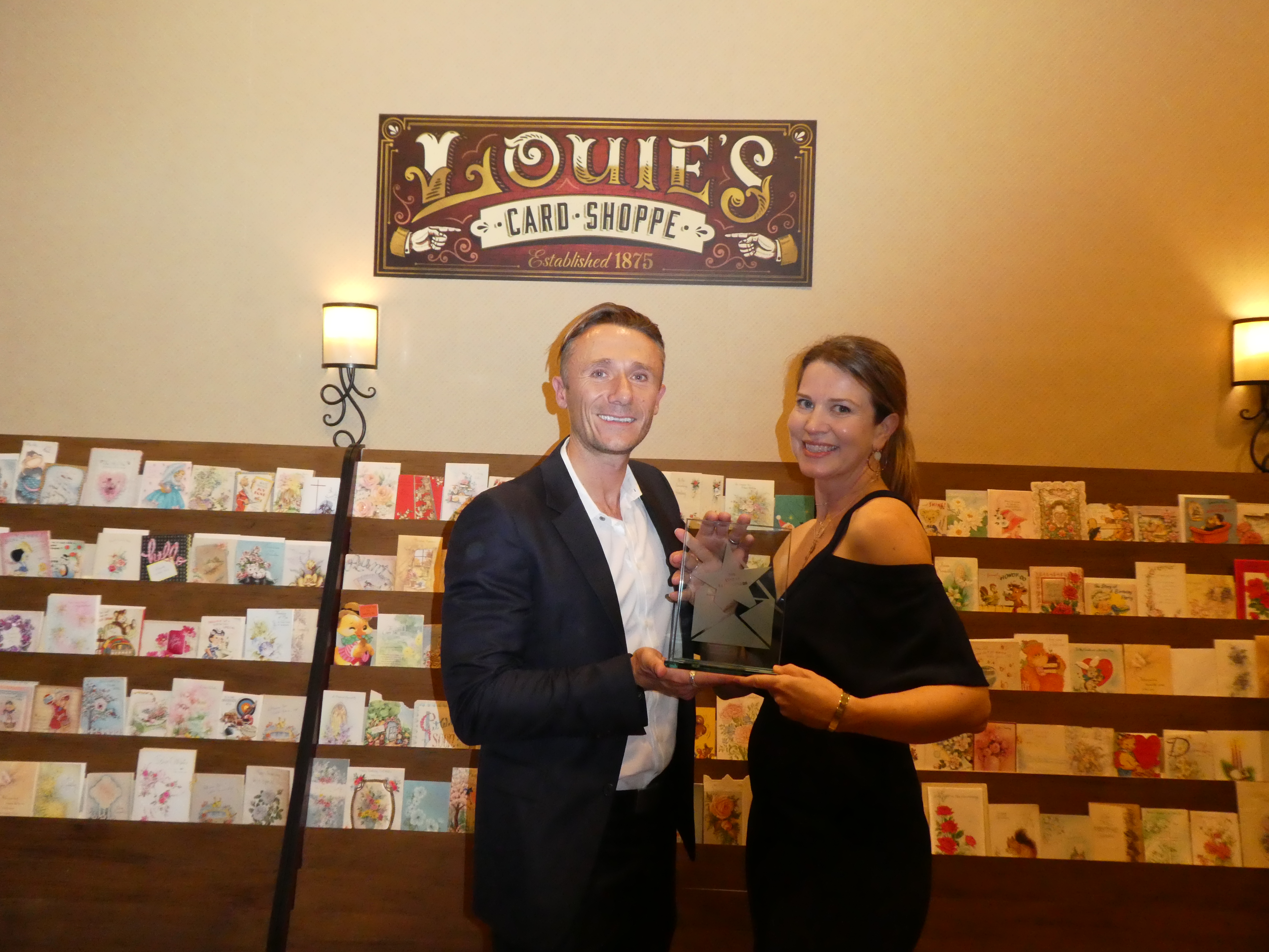 Above: Think of Me’s Dan and Freya Kane at last year’s Louies’ event with their trophy.