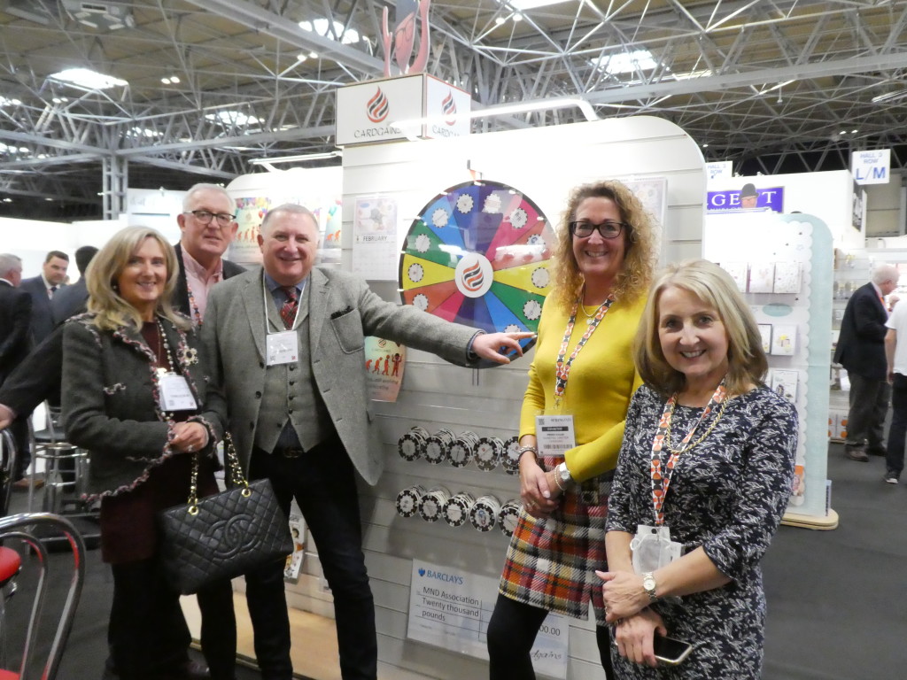 Above: (Far left and third left) Debbie and Jerry Brown with Cardgains’ Chris Dyson and Penny Shaw (second right) with Xpressions’ Christine Harrison on the Cardgains Village Green stand at Spring Fair.
