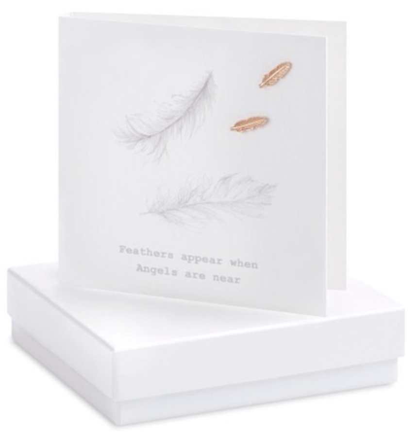 Above: Delicate earrings are affixed to the gift boxed card from Crumble and Core.