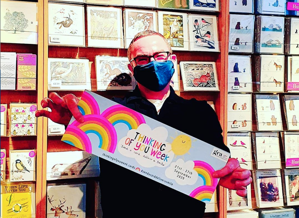 Above: Independent retailer, Michael Apter, owner of the Paper Tiger shops in Edinburgh promoting Thinking of You Week. 