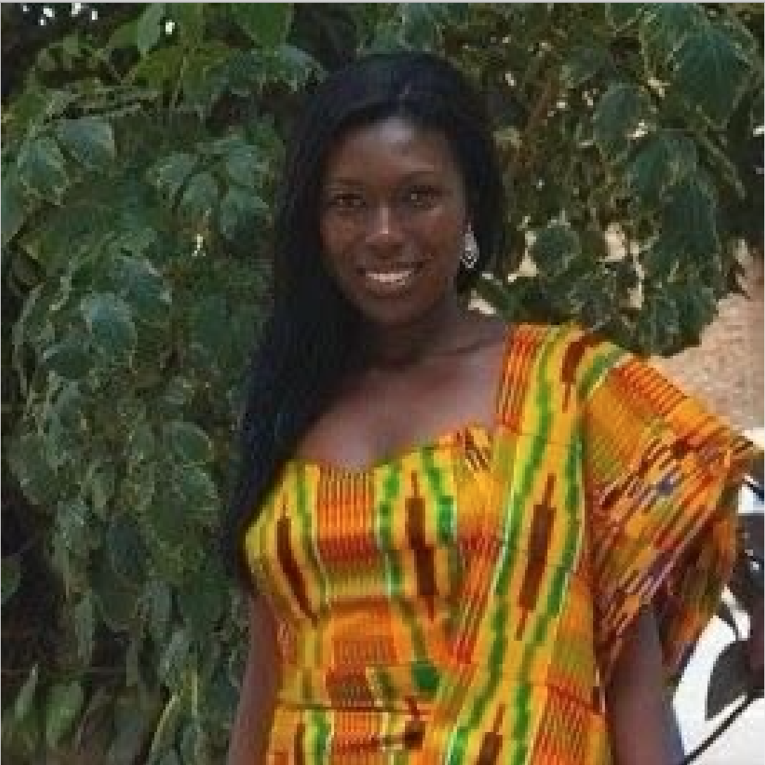 Above: Adriana wearing traditional Ghanaian kente cloth during a holiday in Ghana. 