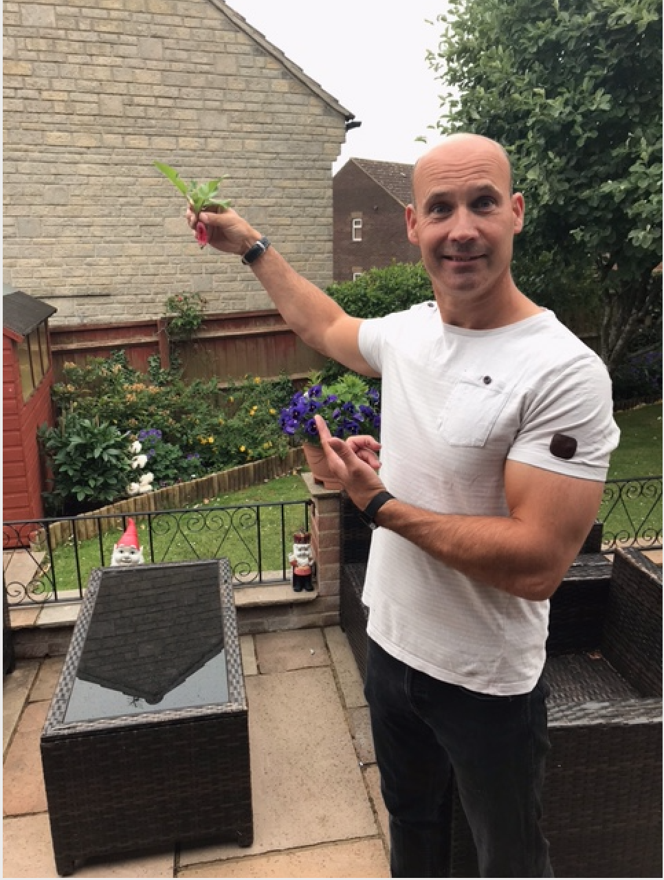Above: Derren last summer during lockdown when he tried growing veg. This one is one of him looking particularly ‘Raddishing’.