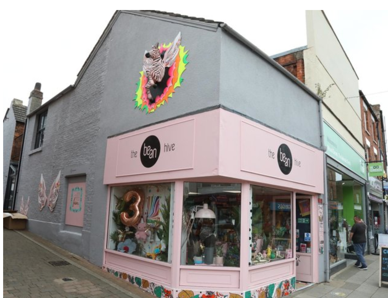 Above: The Bean Hive in Kettering has become a well loved emporium in the three years since it opened, now withartwork by local Cathy Matthews adorning the shop in the form of a pink and black zebra bursting out of the wall.