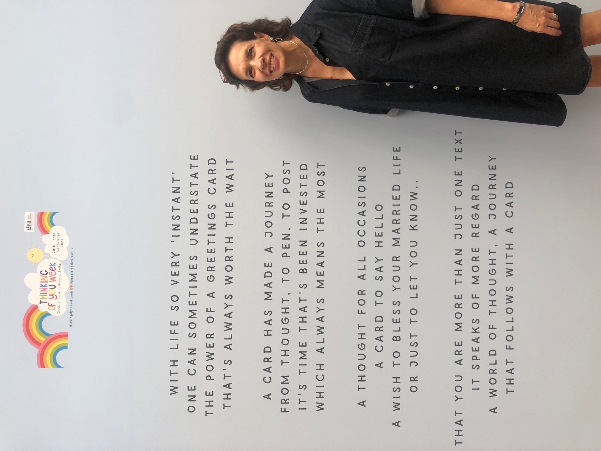 Above: Amanda Fergusson, ceo of the GCA next to a wall installation at Top Drawer featuring a poem that Helen Walters of Shmuncki Verse wrote to tie in Thinking of You Week about the value of sending cards. 