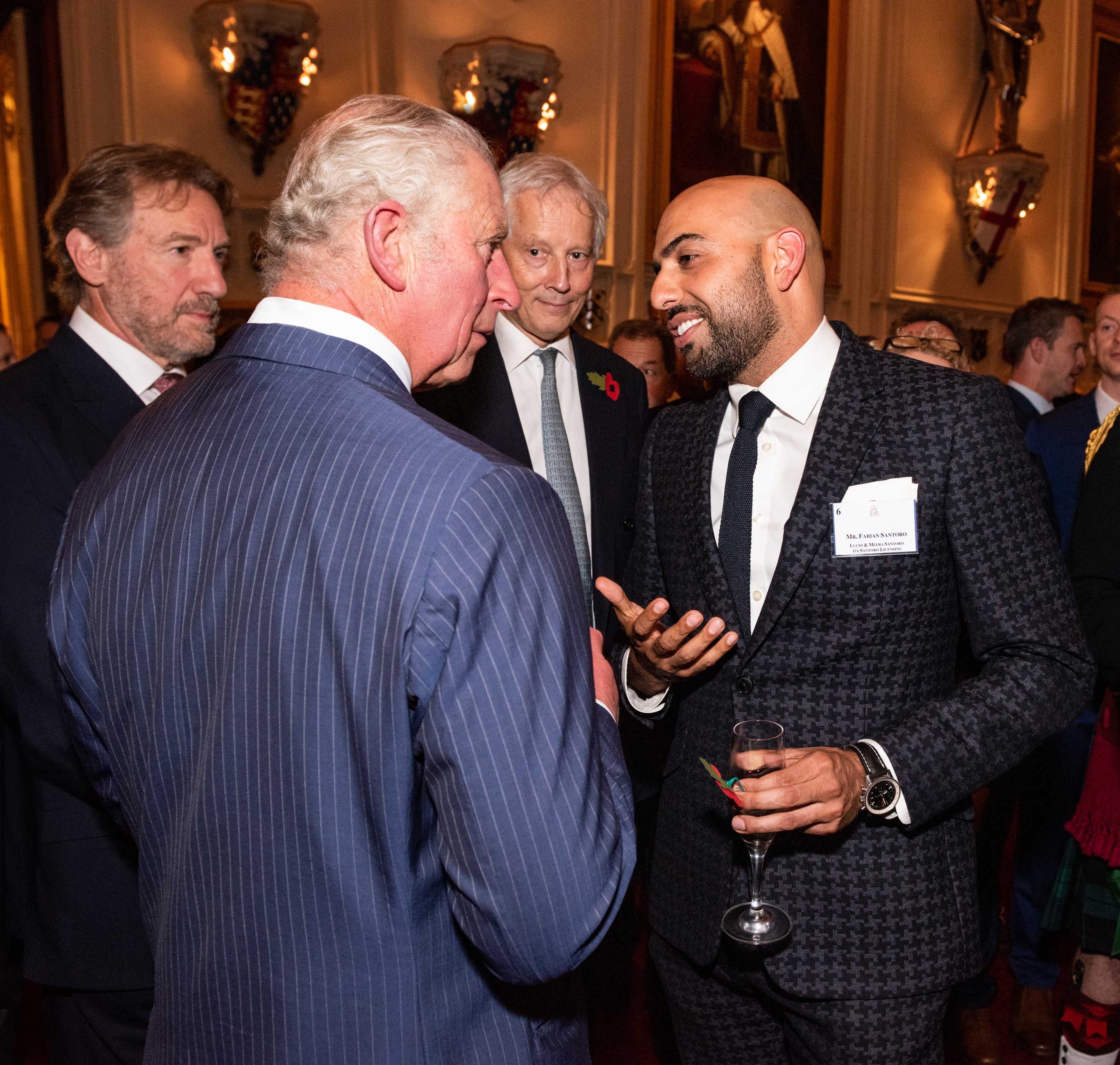 Above: Fabian Santoro (left) talking to Prince Charles at the event that was held in Windsor Castle a few days ago.