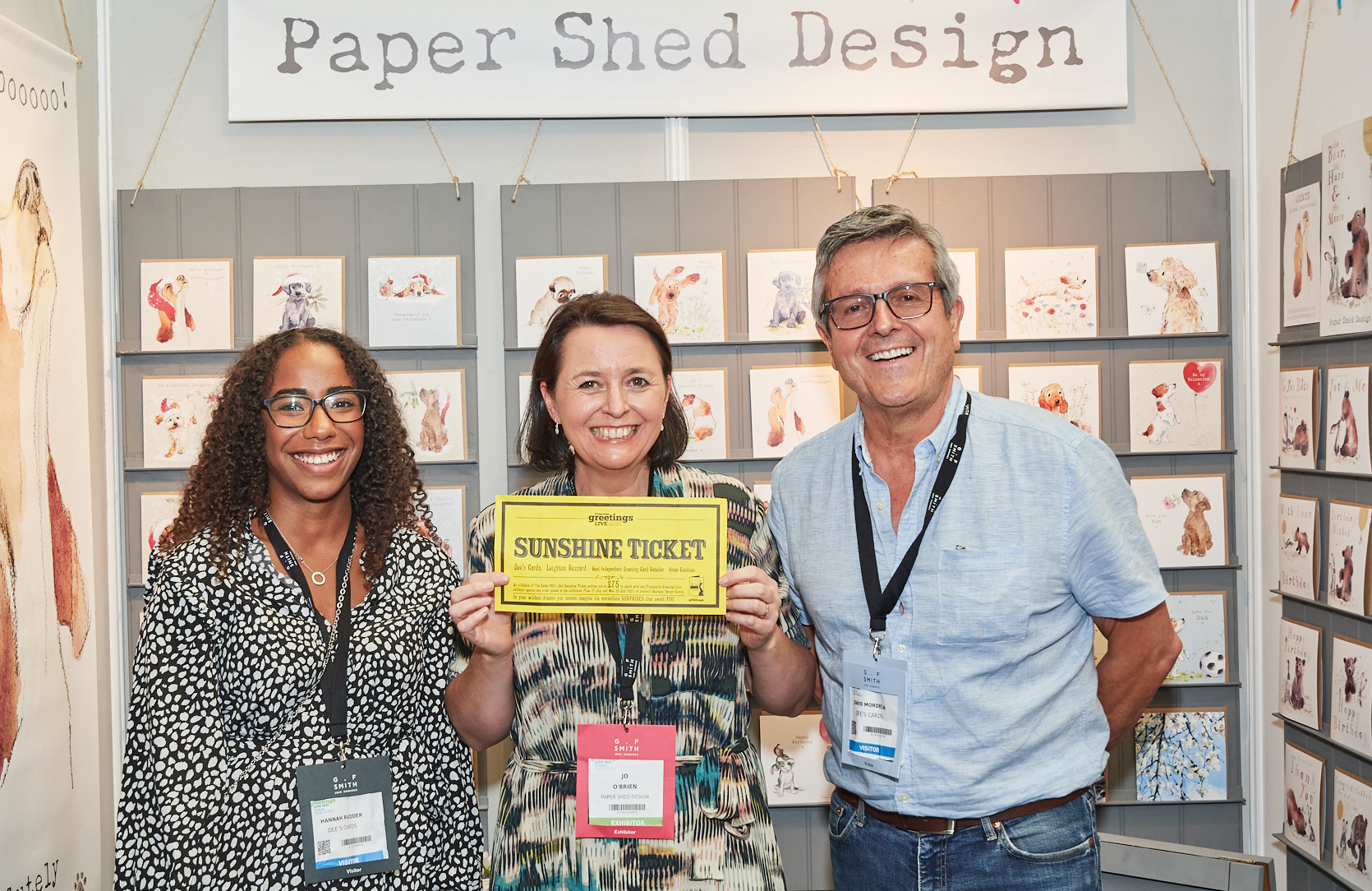 Above: Having debuted at PG Live this year, Paper Shed Designs is getting ready to rock at the 2022 show. Founder Jo O’Brien (centre) with Dees Cards’ Hannah Rudder and Paul Mordecai.