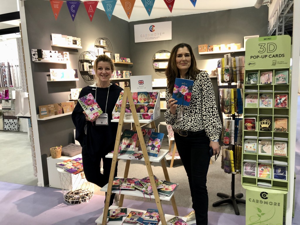 Above: Cardmore christened the launch of its licensed stationery ranges with Sarah Kelleher and Stephanie Dyment at the show. Greeting card publisher Sarah (right) was delighted to see her bold floral imagery be translated on to a range of notebooks and journals