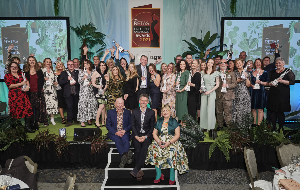 Above: The winners of the 2021 Retas awards with Max Publishing’s Warren Lomax and Jakki Brown, on the stage steps with event host Stuart Goldsmith (centre)