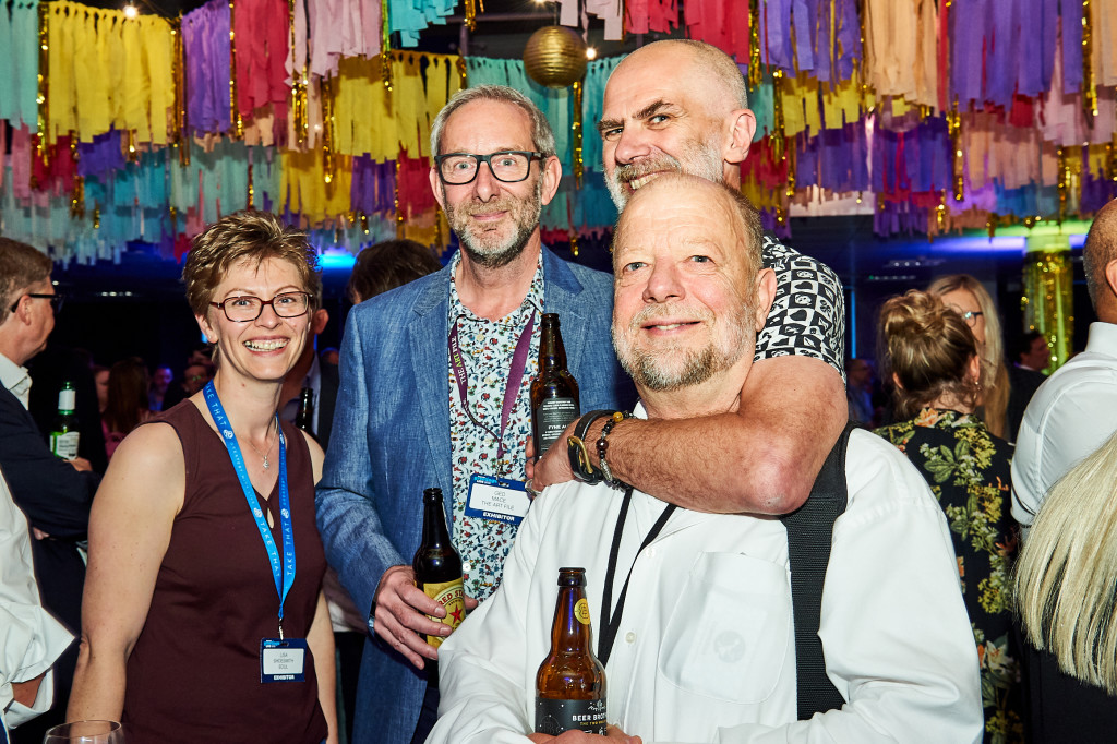 Above: David with good friends Ged Mace (second left), Alan Hawkes and Lisa Shoesmith, who was general manager of Really Good and Soul, at a PG Live opening night party