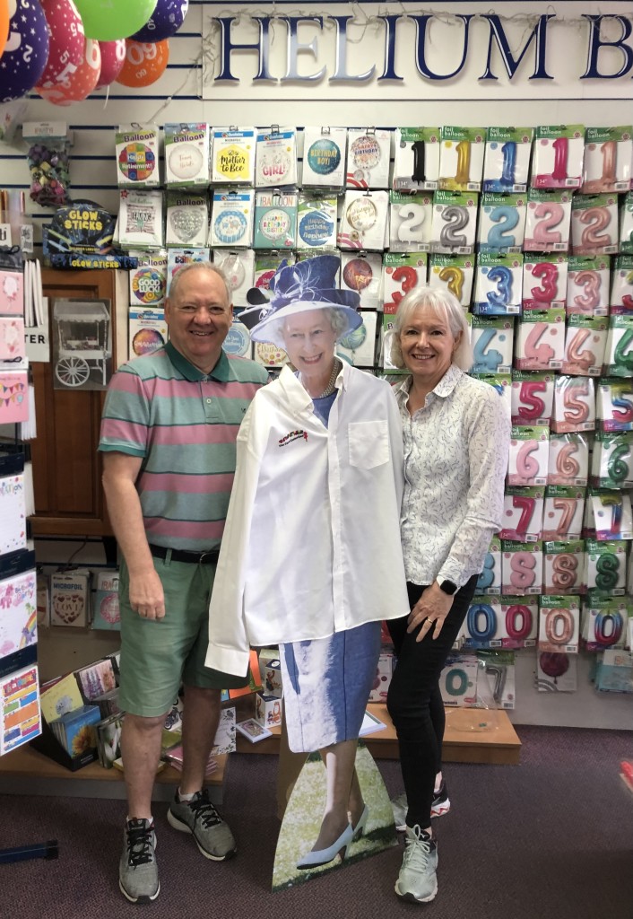 Above: Roy and Julia Beswick, co-owners of The Card Collection with a potential new employee!