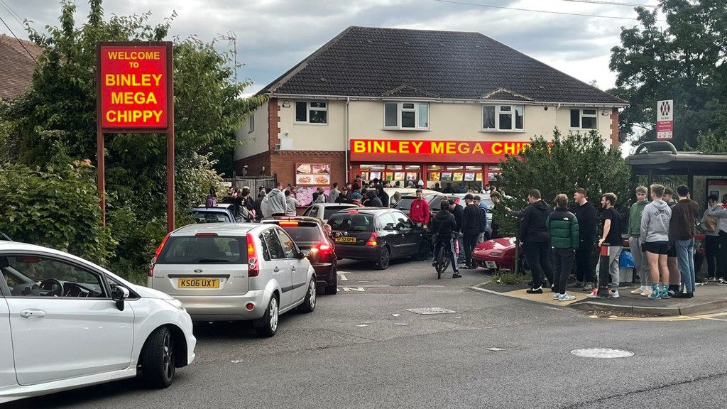 Above: Good cod – queues in Binley (pic from Sky News/Simon Langley)