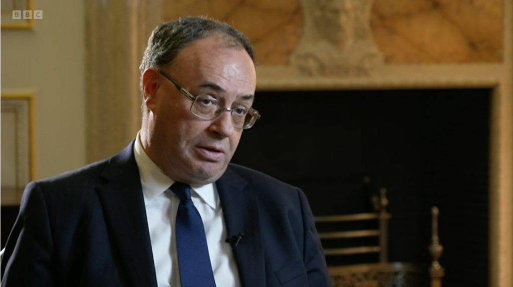 Above: Bank of England governor Andrew Bailey told the BBC a recession is forecast