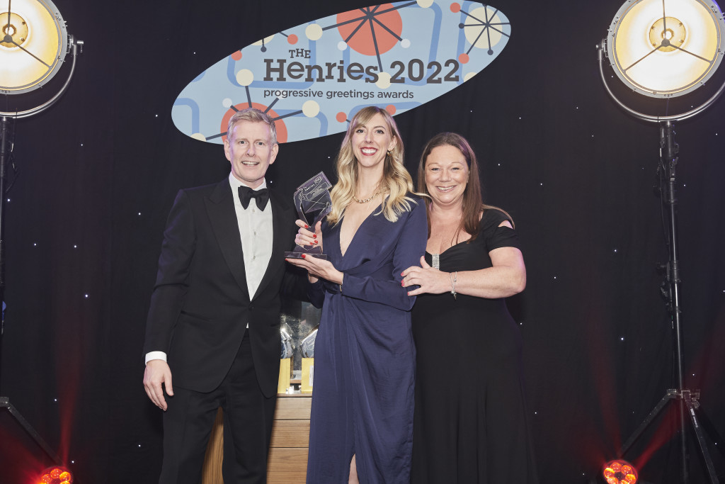 Above: Stormy Knight’s Sarah Jackson (centre) with the trophy presented by Michelle Mills, business development manager of category sponsor Windles