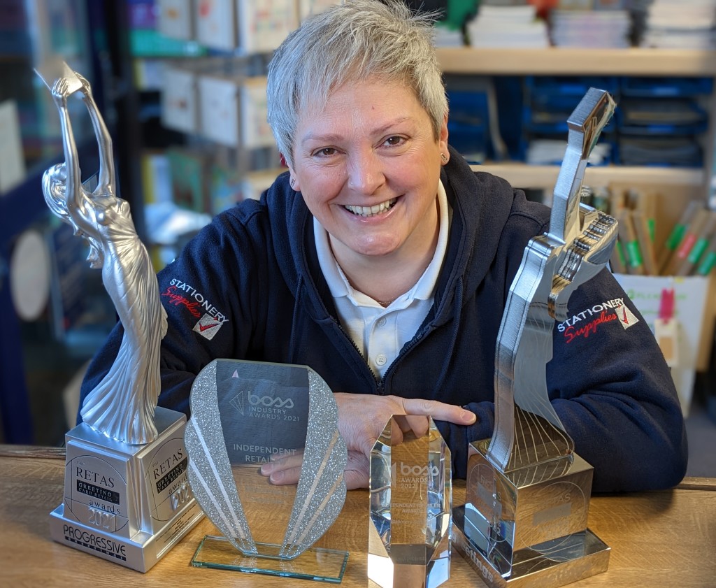Above: Sarah Laker with her growing trophy collection – two Retas awards and now two BOSS ones too!