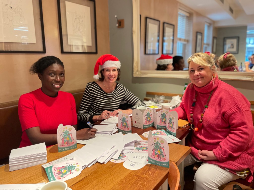 Above: (from left) GCA’s Adriana Lovesy and Amanda Fergusson with PG’s Jakki Brown preparing the GCA Christmas cards for a Festive Friday send