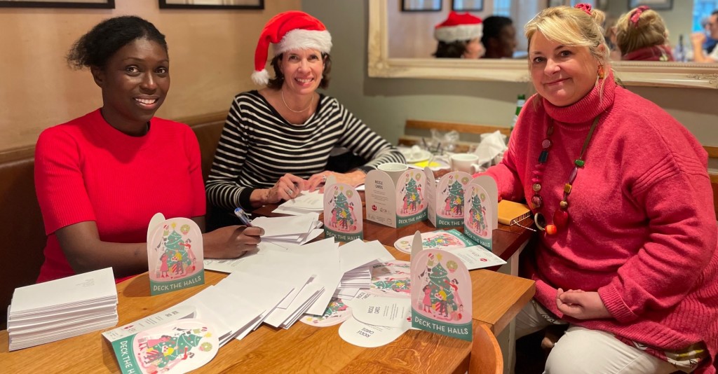 Above: The GCA’s Adriana Lovesy (left) and Amanda Fergusson with PG’s Jakki Brown (right) writing all the association’s Christmas cards, this year designed by Ricicle Cards and printed by Windles