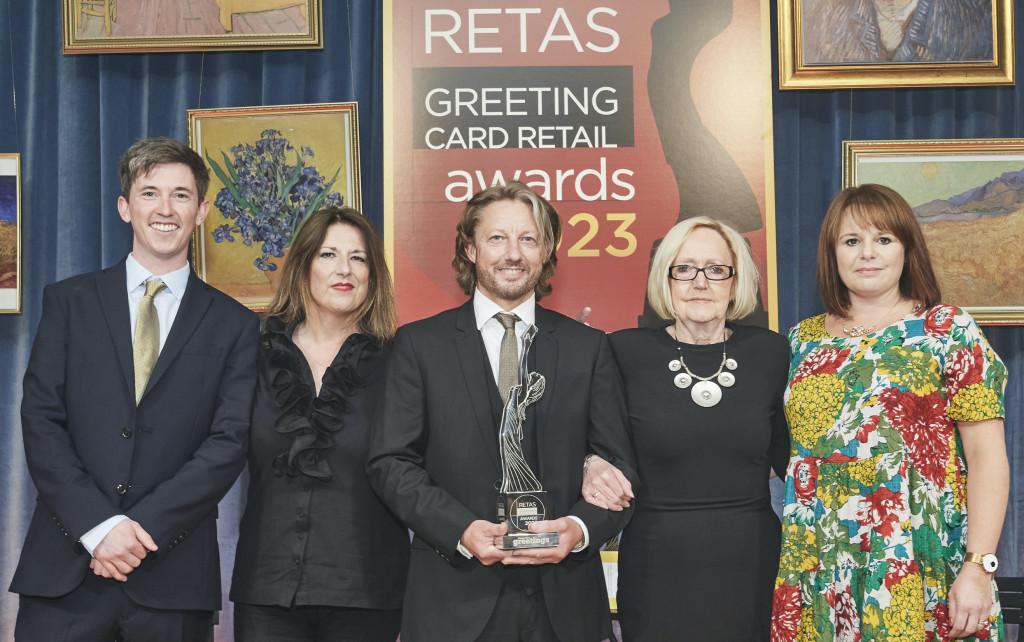 Above: Stephen McHale (centre) is very proud as he collects the Best Independent Greeting Card Retailer The Midlands from Claire Williams (right) of category sponsor Paper Salad earlier this month