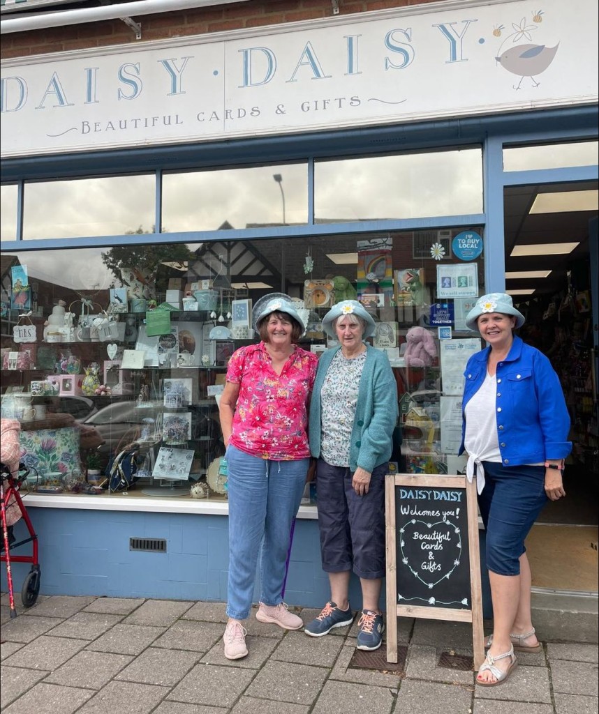 Above: Daisy hats were de rigeur for these customers who popped in during the City Hospice’s Dedicate A Daisy campaign at Cardiff Castle in August