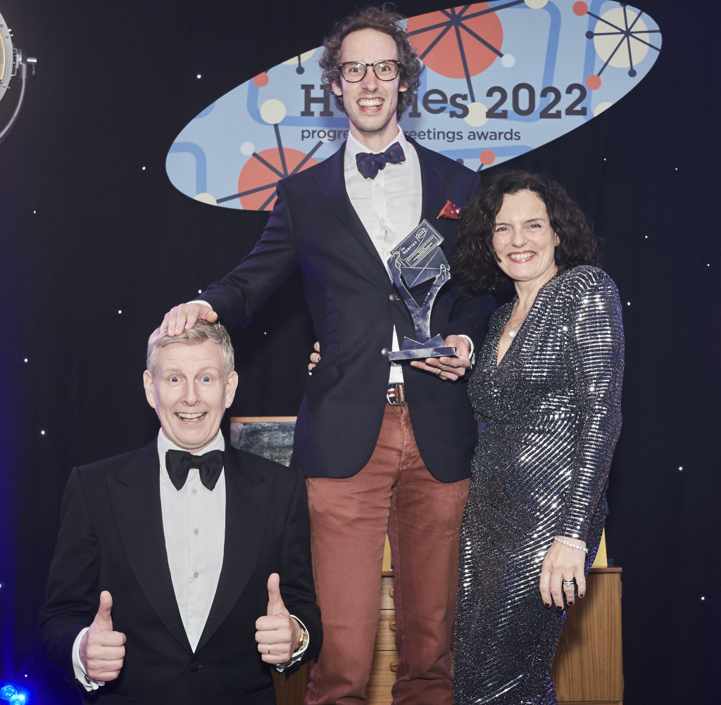 Above: Bewilderbeest’s Iain Hamilton (centre) collected the trophy for The Lynn Tait Most Promising Young Designer Or Artist award at last year’s Henries from Leona Janson-Smith, director of Postmark, who sponsored the award at the event hosted by Patrick Kielty (left)